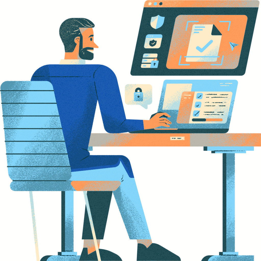 Man working on dual computer screens, graphic design